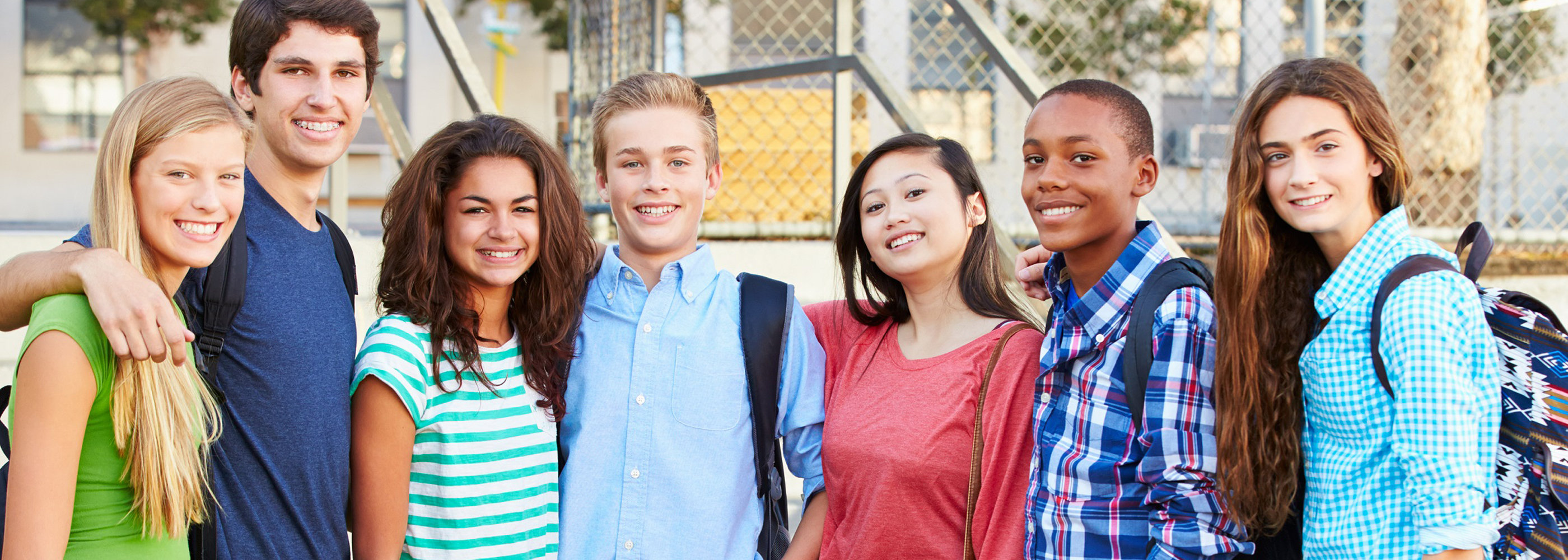 high school students smiling for camera